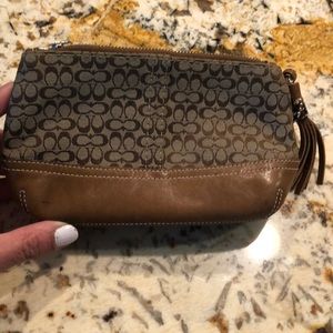 Mini authentic coach pouch.